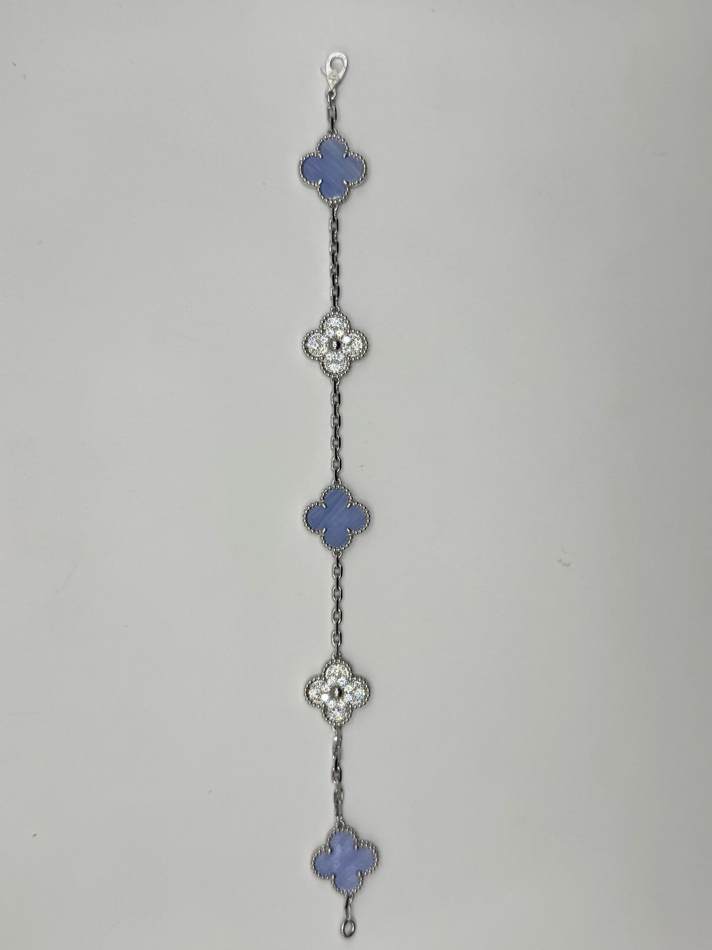 Pulsos de plata TIPO Van
Cleef Plata .925 bañada en oro plata lila con zirconia