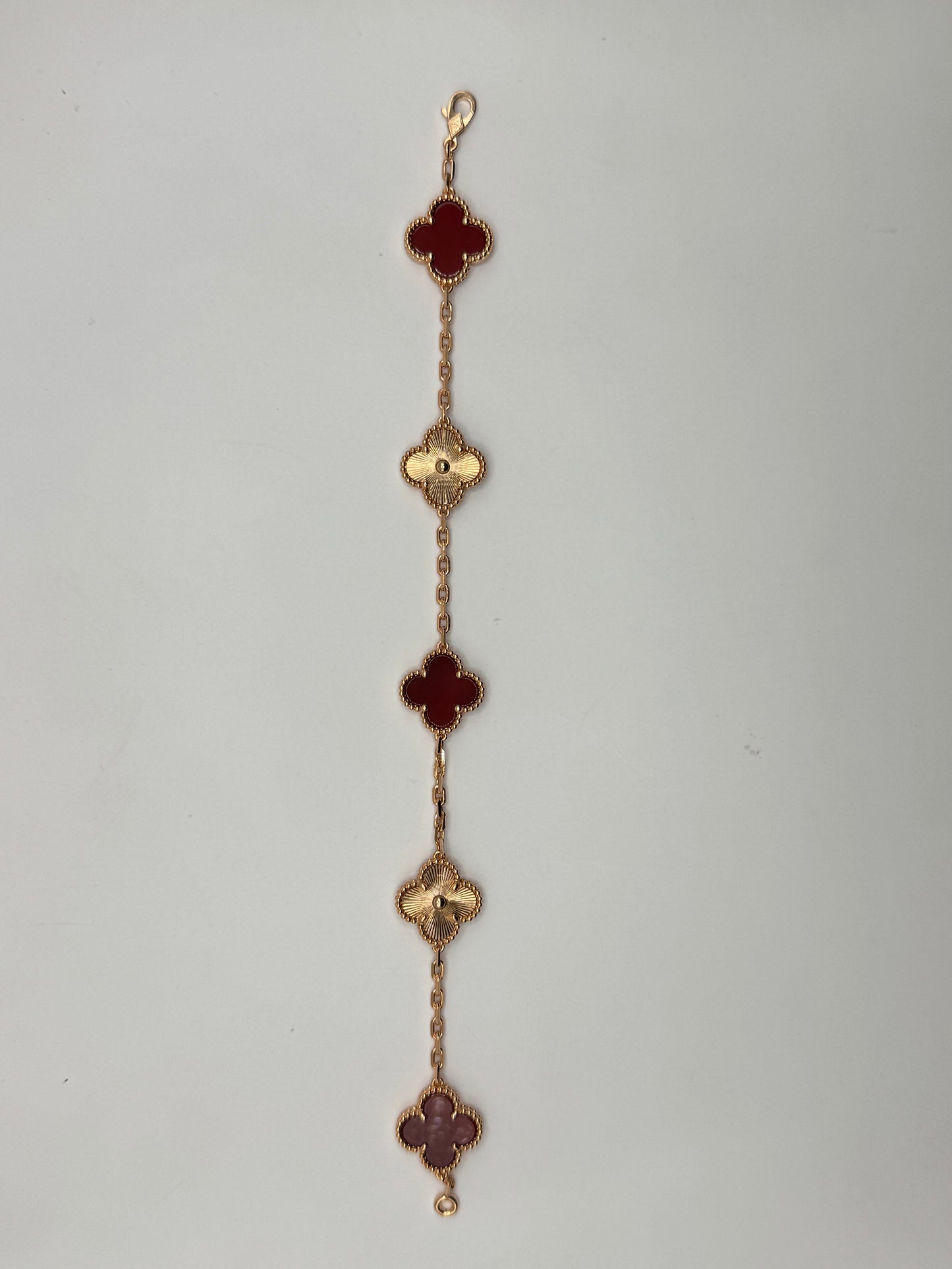 Pulsos de plata TIPO Van
Cleef Plata .925 bañada en oro bronce con tinto